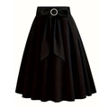 Elegant high-waisted black A-line skirt featuring a large bow and silver ring buckle - S / Black