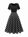Vintage 1950s style polka dot dress with V-neck and ruffle sleeves in black and white - S / Black