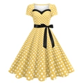 Retro yellow polka dot dress with black heart-shaped neckline and ribbon waist belt - S / Yellow