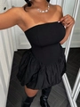 Detailweergave van de zwarte strapless mini-jurk met elegante ballonzoom en slim fit - XS / Zwart