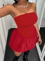 Detail van rode strapless jurk met bubble zoom en nauwsluitend bovenstukje - XS / Rood