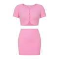 Dettaglio del tessuto rosa a nido d'ape e degli eleganti bottoni a perla sul crop top - S / Rosa