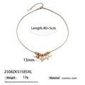 Detail of 18k gold plated snake chain necklace with bee, pearl, and star charms - 2508zk51585xl