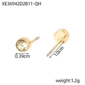 Minimalist gold stainless steel stud earrings featuring a round champagne zircon inlay - November Yellow
