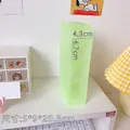 Pale green translucent desk organizer with four slanted compartments for pens and makeup - Macaron Light Green
