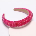 Handmade thick padded headband with sparkling bright rose pink crystals on round stand - Rose Red