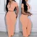 Schickes zweiteiliges Set mit orangefarbenem Wellentop und hoher Hosentasche - S / Oberteil Und Hose / Orange