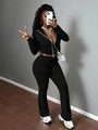 Completo due pezzi da donna in maglia a costine nera con felpa con zip e pantaloni larghi - S / Nero