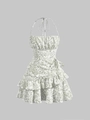 Floral halter tiered mini dress in white and green with a vintage ruffled hemline - S / Green
