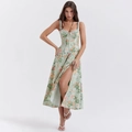 Französisches Midi-Blumenkleid mit Spaghettiträgern, Seitenschlitz und Schnürdetail - Grün