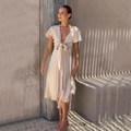 Beige asymmetric high-low dress with V-neck and bow tie detail in light fabric - Champagne