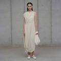 Minimalist cream sleeveless long dress with twist waist and asymmetric wrap skirt detail - S / Apricot