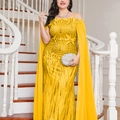 Close-up detail of yellow sequin evening gown with chiffon cape sleeves and radiant patterns - 3XL / Yellow