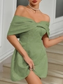 Detail of sage green cocktail dress featuring textured floral jacquard and a front knot - Light Green