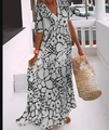 Vue détaillée d'une robe maxi bohème à col en V, imprimé fleuri et sac en paille tressé - S / Noir