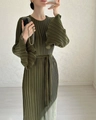 Detail of olive green pleated maxi dress with flared ruffled cuffs and waist tie - S / Olive Green