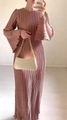 Detail of elegant pleated maxi dress featuring flared sleeves and fine vertical textures - S / Coral Pink