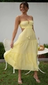 Pale yellow sleeveless maxi dress with side cut-outs and a tiered ruffle skirt - S / Yellow