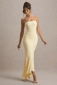 Detail of the pale yellow strapless dress showing pleated waist and ruffled fishtail hem - S / Light Yellow