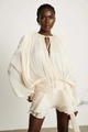 Detail of ivory silk pleated puff sleeve dress with tie-neck and textured fabric - S / Apricot