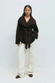 Full body view of a woman wearing a dark brown wool coat with a belted waist and wide collar - S / Coffee