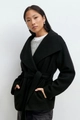 Detail of a black wool coat with wide lapels and a matching waist belt for autumn fashion - S / Tops / Black