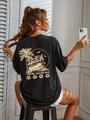 Oversized zwart T-shirt met ronde hals en vintage strandprint op de rug voor de zomervakantie - S / Zwart