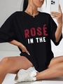 Oversized zwart katoenen dames T-shirt met Rose In The print en ronde halslijn - S / Zwart