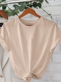 Women's apricot crew neck T-shirt featuring a stylish front knot detail on a wooden hanger - S / Apricot