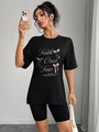 Damen T-Shirt in Schwarz, lockere Passform, Faith Over Fear Print und rosa Schleifen - S / Schwarz