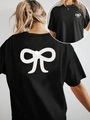 T-shirt nera da donna con girocollo e stampe a fiocco bianco dal design alla moda - Taglia S / Nero
