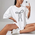 T-shirt bianca oversize in cotone con stampa a fiocco nero e girocollo donna - S / Bianco