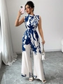 Tuta da donna senza maniche con stampa a marmo blu e un grande fiocco decorativo sul collo - S / Blu