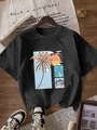 Women's loose black T-shirt with vintage tropical palm tree and sunset graphic print - S / Black