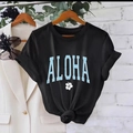 Women's black round neck T-shirt with blue Aloha print and stylish knot-tie waist detail - S / Black