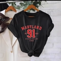 Women's black Maryland 91 graphic t-shirt in loose fit with round neck and knotted hem - S / Black