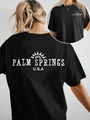 Damen Baumwoll T-Shirt in Schwarz mit Palm Springs USA Grafikprint und lockerem Schnitt - S / Schwarz