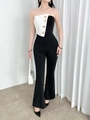 Elegante mono bicolor en blanco y negro con botones dorados y pantalón campana - S / Negro