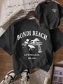 Schwarzes Bondi Beach Grafik-T-Shirt mit Palmen und Retro-Print auf dunklem Holzboden - S / Schwarz