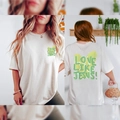 Übergroßes Baumwoll-T-Shirt in Off-White mit grünem Love Like Jesus Aufdruck - S / Weiß