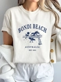 Women's cream Bondi Beach graphic T-shirt with short sleeves and relaxed fit - S / White