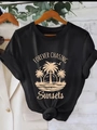 Damen T-Shirt in Schwarz mit Rundhalsausschnitt und Sonnenuntergang-Grafikdruck - S / Schwarz