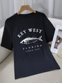 Women's black cotton T-shirt with Key West Florida vintage fish print on hanger - S / Black