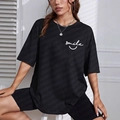 T-shirt casual nera da donna vestibilità comoda con stampa smile e scollo rotondo - S / Nero