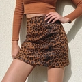 Short leopard print A-line mini skirt paired with a brown knit cropped long sleeve top - S / Leopard 1