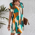 Kurzärmeliges Mini-Kleid mit V-Ausschnitt, geometrischem Colorblocking und H-Linien-Schnitt - S / Mehrfarbig