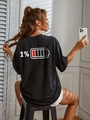Oversized zwart katoenen T-shirt met 1% batterij-opdruk en een ronde halslijn - S / Zwart