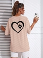 T-shirt da donna oversize color pesca con cuore nero e impronta di zampa sulla schiena - Taglia S / Albicocca