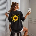 T-shirt nera oversize girocollo con stampa di girasole e farfalle sulla parte posteriore - S / Nero