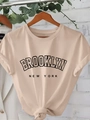 Women's beige short sleeve T-shirt with Brooklyn New York print and stylish knotted hem - S / Khaki